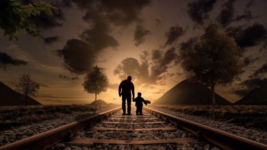 father and son walking railway 2258681